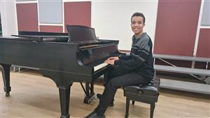 Kimble at Piano